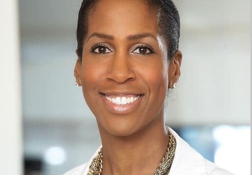 Headshot of Dr. Dixon smiling into the camera. She shares insight on IVF funding in Canada