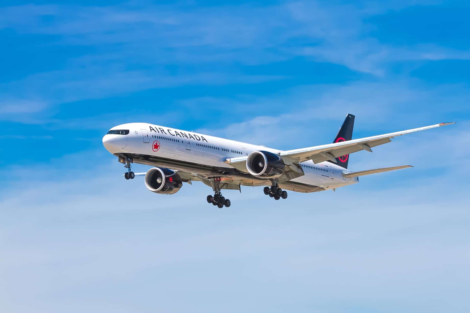 photo of Air Canada plane flying in sky