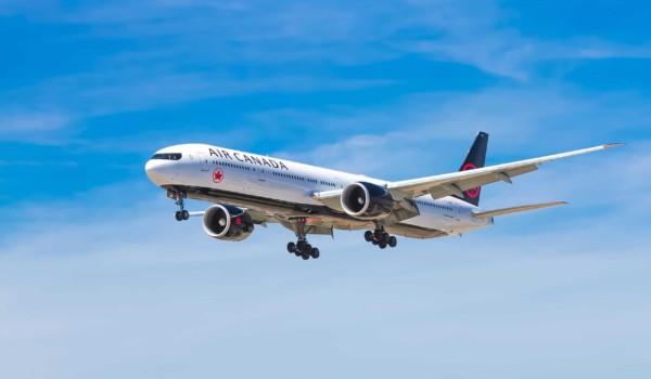 photo of Air Canada plane flying in sky
