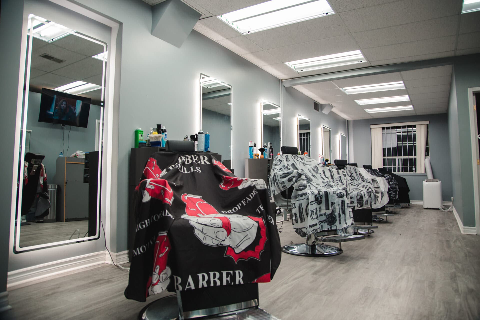 Barber chairs inside a shop.